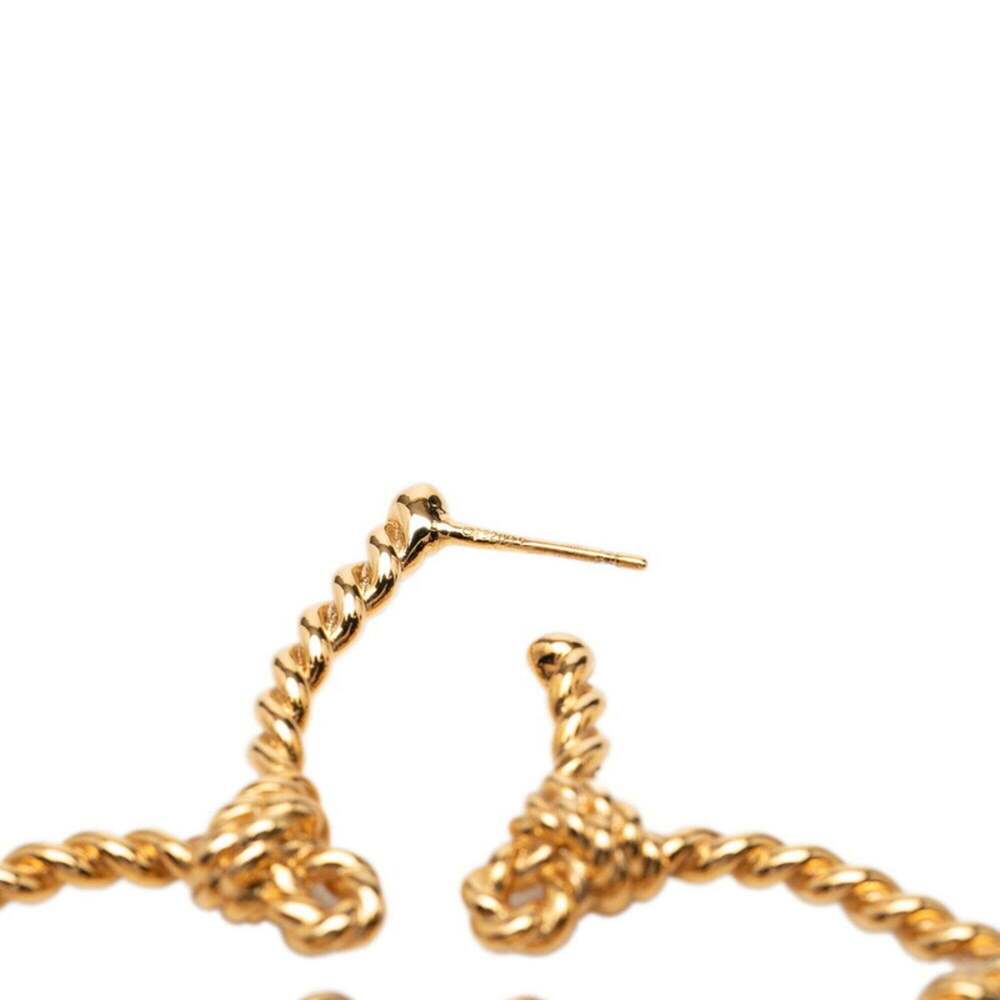 LOUIS VUITTON Brown Monogram Earrings - Picture 4 of 4